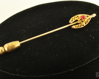 Yellow gold (filled) and ruby wishbone-shaped vintage stick pin, raised & fluted center detail, brass clutch stopper