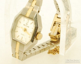 Waltham quartz ladies' wrist watch, heavy gold-toned & stainless steel faceted rectangular case, matching band