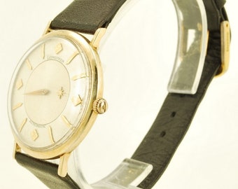 Longines vintage automatic wrist watch, 17 jewels, yellow gold (filled) case, "mystery hand" dial, with box