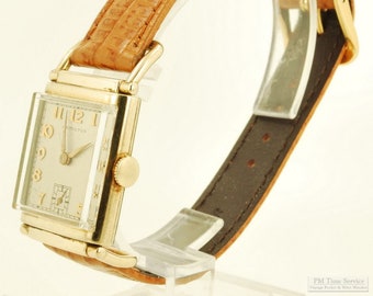 Hamilton grade 980 vintage wrist watch, 17 jewels, distinctive yellow gold (filled) rectangular Wilshire model case