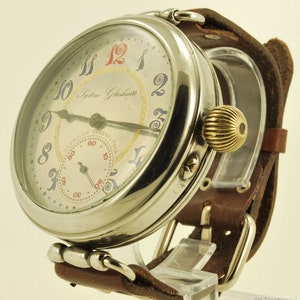 Deutsche Uhrenfabrik - System Glashutte vintage pilot&#39;s wrist watch, 45mm 7-jewel movement, heavy silver-toned round barrel case