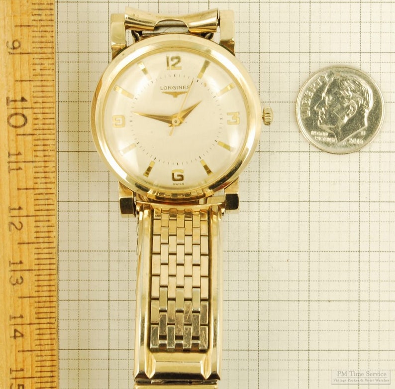 Longines grade 23ZS vintage wrist watch, 17 jewels, yellow gold filled round case with fancy faceted extended lugs image 6