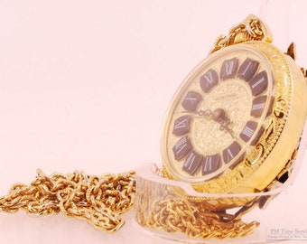 Basis Watch Co. for Heritage vintage pendant watch, 1 jewel, gold-toned case, filigree design with cameo, includes chain