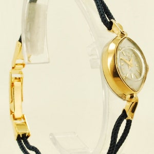 Helbros vintage ladies' wrist watch, 21 jewels, attractive gold-toned & stainless steel slender oval-shaped case image 2