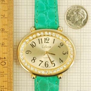 Reloj Collezio Collezio Quartz Ladies' Wrist Watch, Distinctive Wide-oval Gold-toned ...