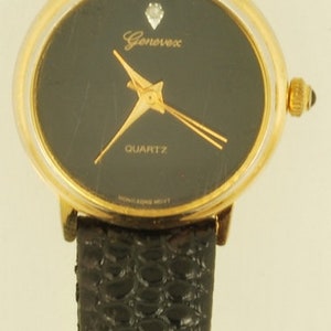 Genevex quartz ladies' wrist watch, museum style, attractive round gold-toned & stainless steel case image 3