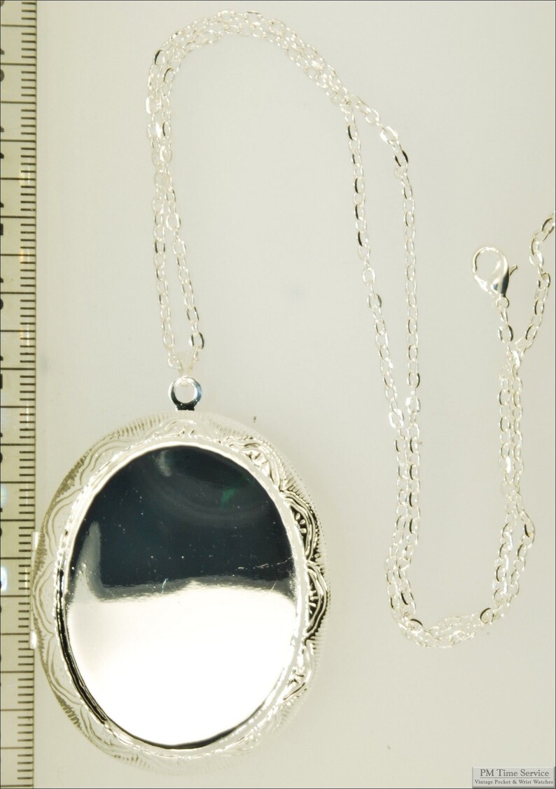 Large oval locket, choice of gemstone & glass cabochons, with necklace options silver; link chain