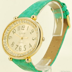 Collezio quartz ladies&#39; wrist watch, distinctive wide-oval gold-toned & stainless steel case