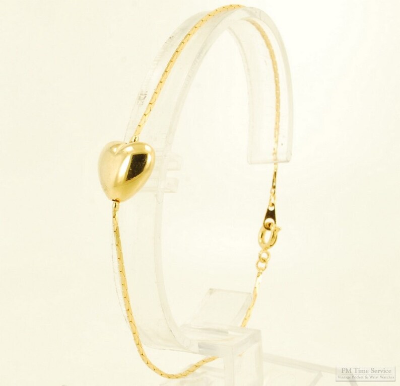 8 yellow gold plated snake-style link bracelet with a puffed heart accent image 1