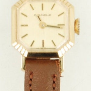 Caravelle by Bulova vintage ladies' wrist watch, 17 jewels, YBM & SS case, gold-toned pattern finish dial image 4