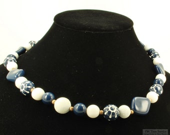 Wood, acrylic and brass 25" necklace with dark navy blue and pure white beads