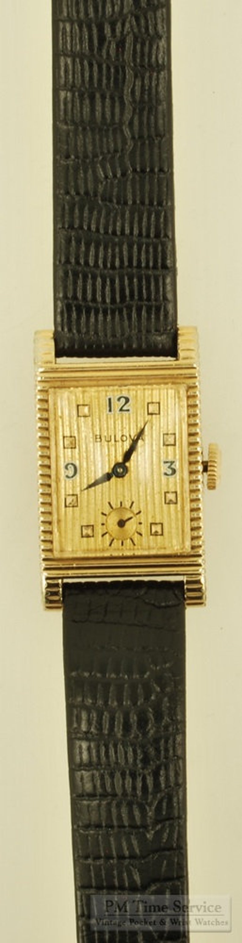 Bulova vintage grade 7AK 49 wrist watch, 21 jewels, distinctive yellow gold filled rectangular case with a scalloped design image 4