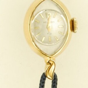 Helbros vintage ladies' wrist watch, 21 jewels, attractive gold-toned & stainless steel slender oval-shaped case image 3