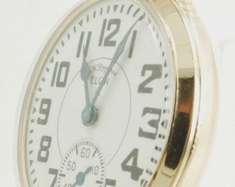Vintage Elgin "B.W. Raymond" zakhorloge, klasse 571, maat 16, 21 jewels, geelgoud (gevuld), model #3055, SB&B kast.