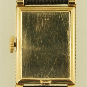 Bulova vintage grade 7AK 49 wrist watch, 21 jewels, distinctive yellow gold filled rectangular case with a scalloped design image 5