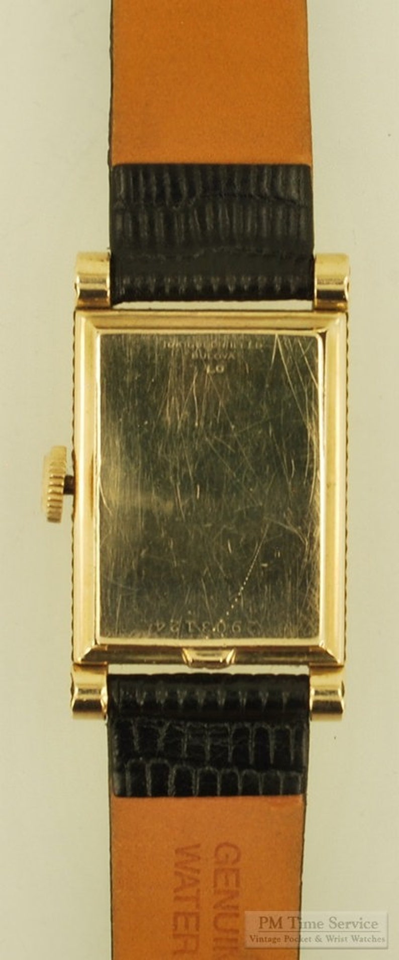 Bulova vintage grade 7AK 49 wrist watch, 21 jewels, distinctive yellow gold filled rectangular case with a scalloped design image 5