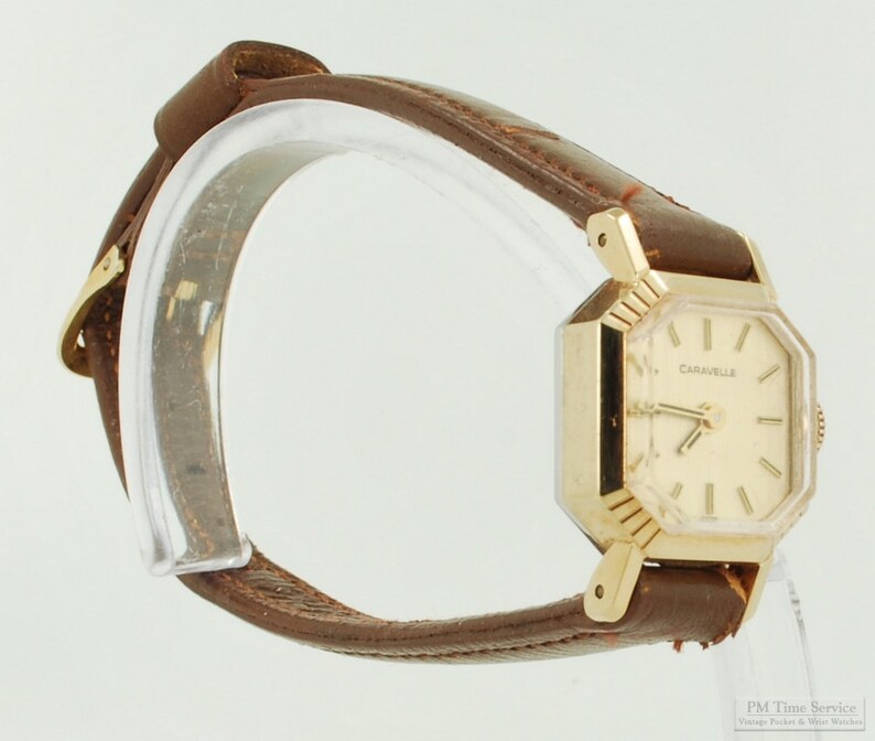 Caravelle by Bulova vintage ladies' wrist watch, 17 jewels, YBM & SS case, gold-toned pattern finish dial image 2