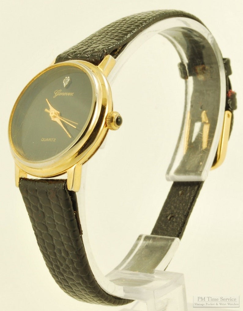 Genevex quartz ladies' wrist watch, museum style, attractive round gold-toned & stainless steel case image 1