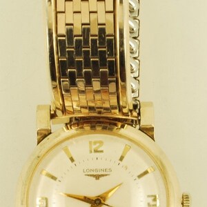 Longines grade 23ZS vintage wrist watch, 17 jewels, yellow gold filled round case with fancy faceted extended lugs image 4