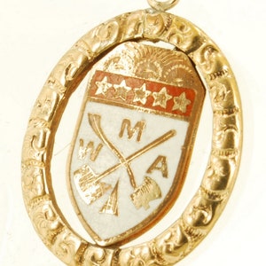 Vintage yellow gold (filled) & enamel fancy oval Modern Woodmen of America (MWA) pocket watch chain fob