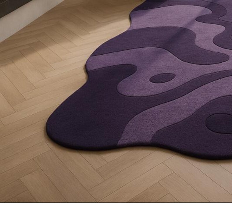 Hand tufted irregular purple abstract wool rug with wavy layered design, modern statement carpet for living room décor"
