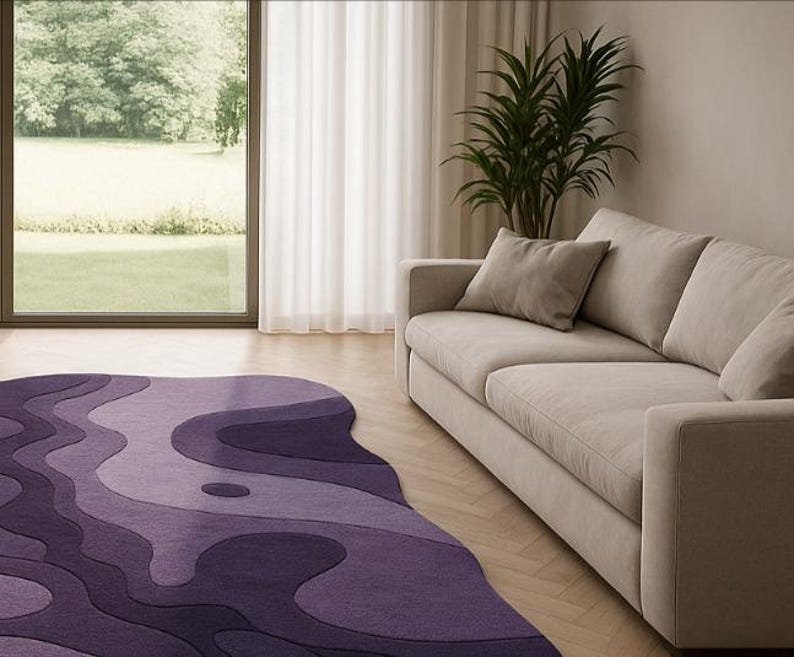 Hand tufted irregular purple abstract wool rug with wavy layered design, modern statement carpet for living room décor"