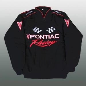 May include: Black Pontiac Racing jacket with red and white embroidered details. Features the Pontiac logo on the chest and shoulders, along with checkered flag graphics. The jacket has a zip-up front and a stand-up collar.