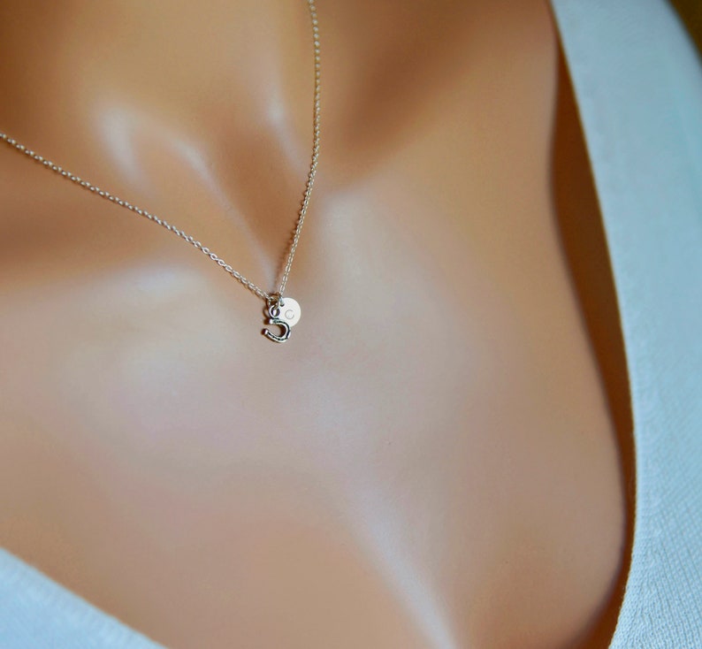 tiny little sterling silver horseshoe necklace. your choice of a silver or gold chain. optional initial disc
