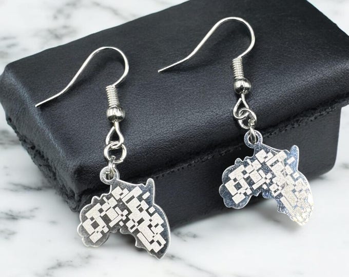 African Elegance: Silver Map Earrings Selection