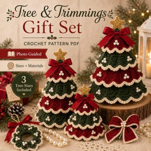 May include: A crochet pattern PDF titled Tree & Trimmings Gift Set featuring three tiered Christmas trees in dark green and deep red with cream scalloped edges, pearl accents, and gold stars. Includes a matching wreath and bow ornament.