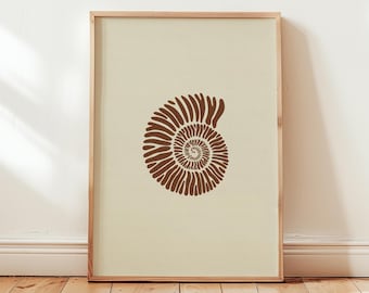 May include: A rectangular wall art print in a light wooden frame featuring a centered brown graphic illustration of a spiral ammonite fossil shell against a solid cream-colored background, displayed in a vertical orientation.
