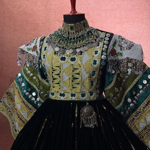 Elegant  black Afghan Dress with Intricate Embroidery and Mirror Work