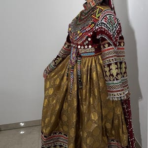Elegant Afghan Dress with Intricate Embroidery and Mirror Work