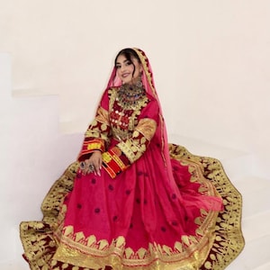 Elegant  black Afghan Dress with Intricate Embroidery and Mirror Work