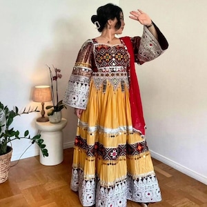 Elegant yallo Afghan Dress with Intricate Embroidery and Mirror Work