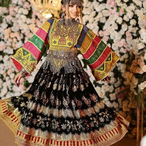 Elegant black Afghan Dress with Intricate Embroidery and Mirror Work