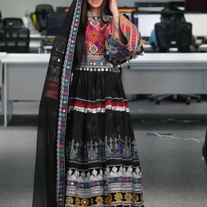 Elegant  black Afghan Dress with Intricate Embroidery and Mirror Work
