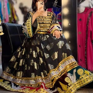 Traditional Black and Gold Embroidered Dress That Turns Heads