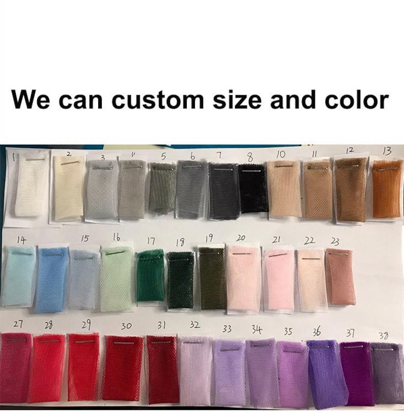May include: A color chart displaying samples of fabric in various colors. The samples are arranged in rows and columns, with each sample labeled with a number. The text "We can custom size and color" is at the top.