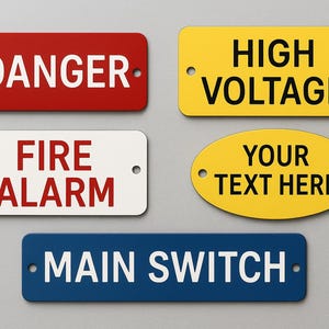 May include: A collection of rectangular and oval warning signs. The signs are red, white, yellow, and blue, with black and white text that reads "DANGER", "FIRE ALARM", "HIGH VOLTAGE", "YOUR TEXT HERE", and "MAIN SWITCH".