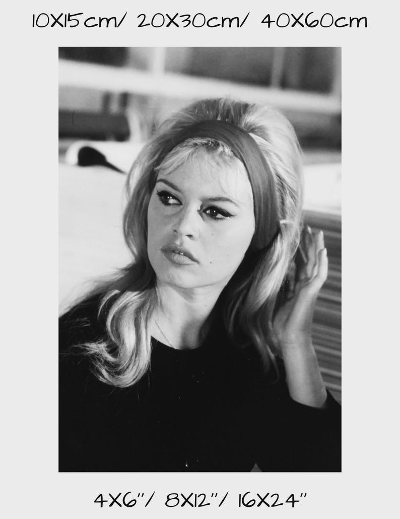 May include: Black and white portrait of a woman with blonde hair, wearing a dark top and a headband. The image is available in 4x6", 8x12", and 16x24" sizes.
