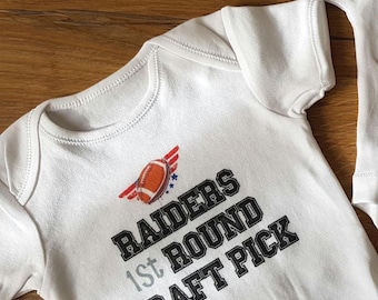 Personlig bodysuit för amerikansk fotboll med "1:a rundans draftval"