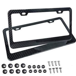 May include: Two black license plate frames with a carbon fiber pattern. The frames are rectangular with rounded corners and mounting holes. Included are black screw caps, washers, and screws for installation.