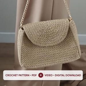 May include: A beige crochet handbag with a flap closure and a gold-tone metal chain strap. The image includes the text: CROCHET PATTERN • PDF + VIDEO • DIGITAL DOWNLOAD. The bag features a textured stitch pattern and a structured rectangular shape.
