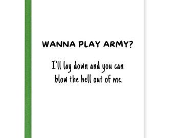 May include: A white greeting card with a green border. The card features the text "WANNA PLAY ARMY? I'll lay down and you can blow the hell out of me" in black font. The card is a humorous item.