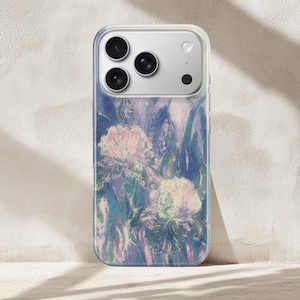 May include: Clear phone case with a floral design in shades of blue, purple, and pink. The case features a clear border and a camera cutout. The floral pattern appears to be an impressionistic painting of irises.