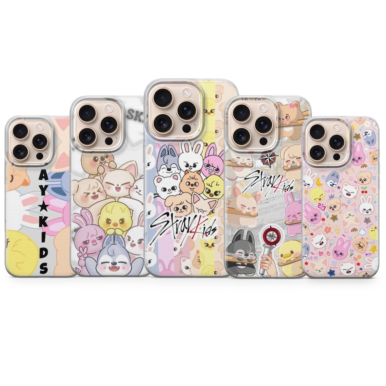May include: A collection of five phone cases with various colorful designs. Each case features a different pattern of cartoon characters and the text "Stray Kids". The cases have a clear border.