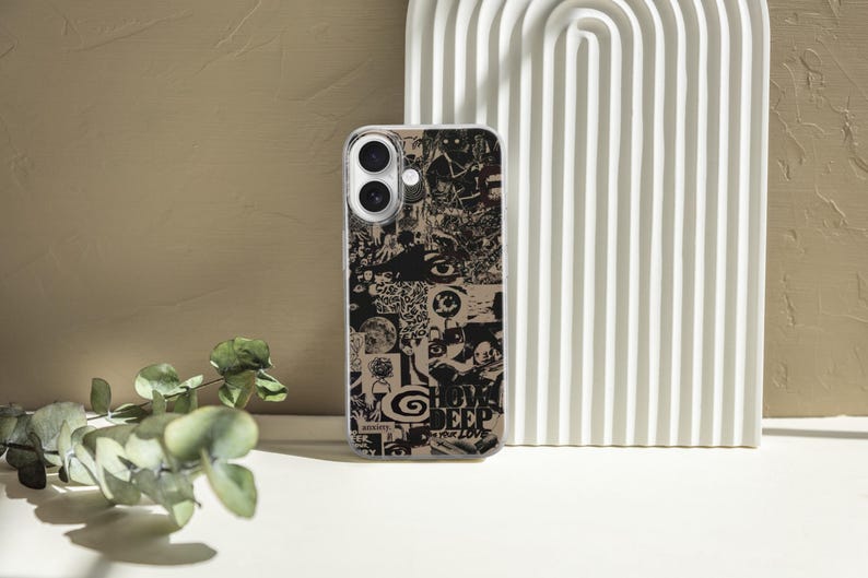 May include: A clear phone case with a black and white collage design. The collage includes various images and the words "SHOW DEEP YOUR LOVE". The case is on a white surface with a beige background and a white arched decorative piece.
