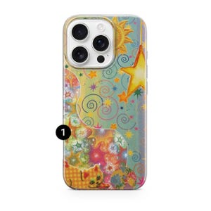 May include: A colorful phone case featuring a whimsical design with a cat, stars, and a sun. The case has a clear border and a vibrant, artistic pattern in shades of yellow, orange, blue, and green. The design includes swirls and a globe.