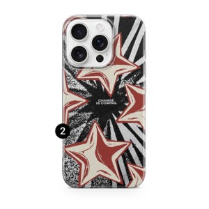 May include: A phone case with a bold design featuring red and cream-colored stars against a black and white striped background. The text "CHANGE IS COMING" is centered on the case.